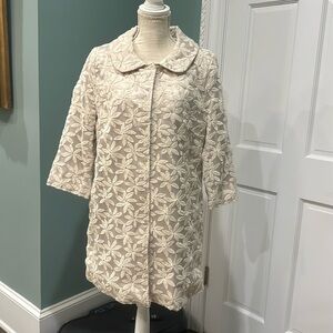 Luii longer length tan floral patterned jacket.  size is XL